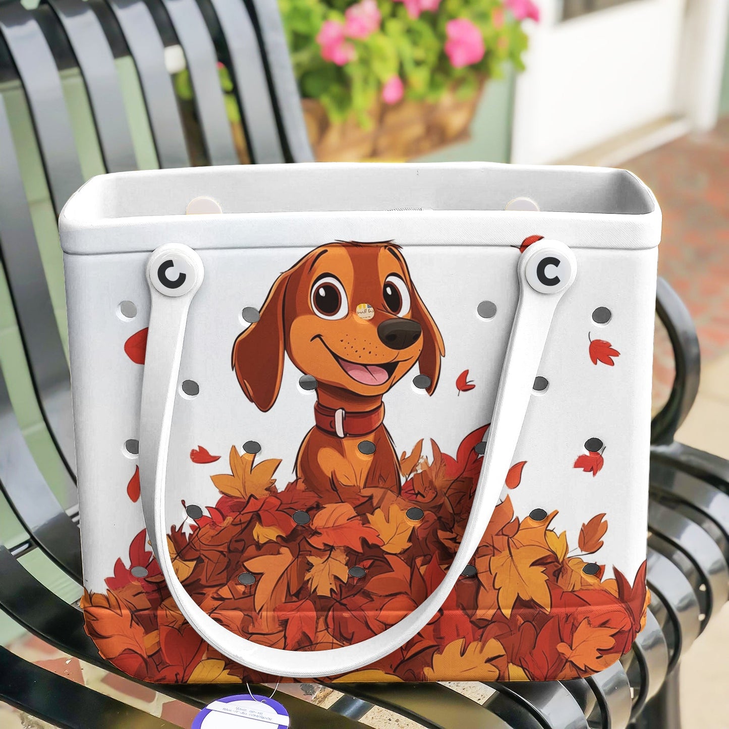 Ceeprints Cee™ Bag Puppy with a pile of autumn leaves