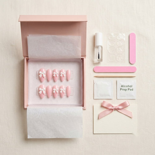 What's in the box: handmade nails and application kit